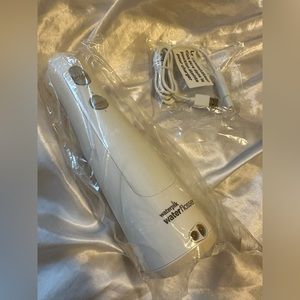 NEW Waterpik water flosser CORDLESS PEARL model WF 13 series